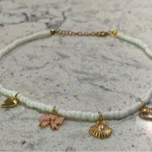 Gold and Pink Charm Necklace